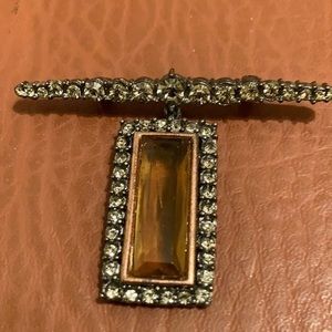 Roxanne Assoulin faux yellow topaz and rhinestone pin set in gunmetal tone